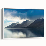 Vintage poster art of the Grand Tetons in vibrant colors on a large framed canvas, suitable for living room decor.