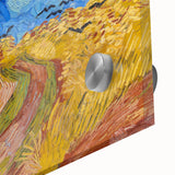 Large abstract wall art depicting a swirling sky in vibrant blue and yellow tones on acrylic glass.