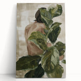 Abstract figurative stretched canvas artwork featuring vibrant colors and dynamic shapes, leaning against a neutral wall, perfect for modern home decor.