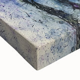 Close-up of a vibrant abstract floral design on stretched canvas, showcasing intricate brush strokes in shades of blue, pink, and green, perfect for modern home decor.