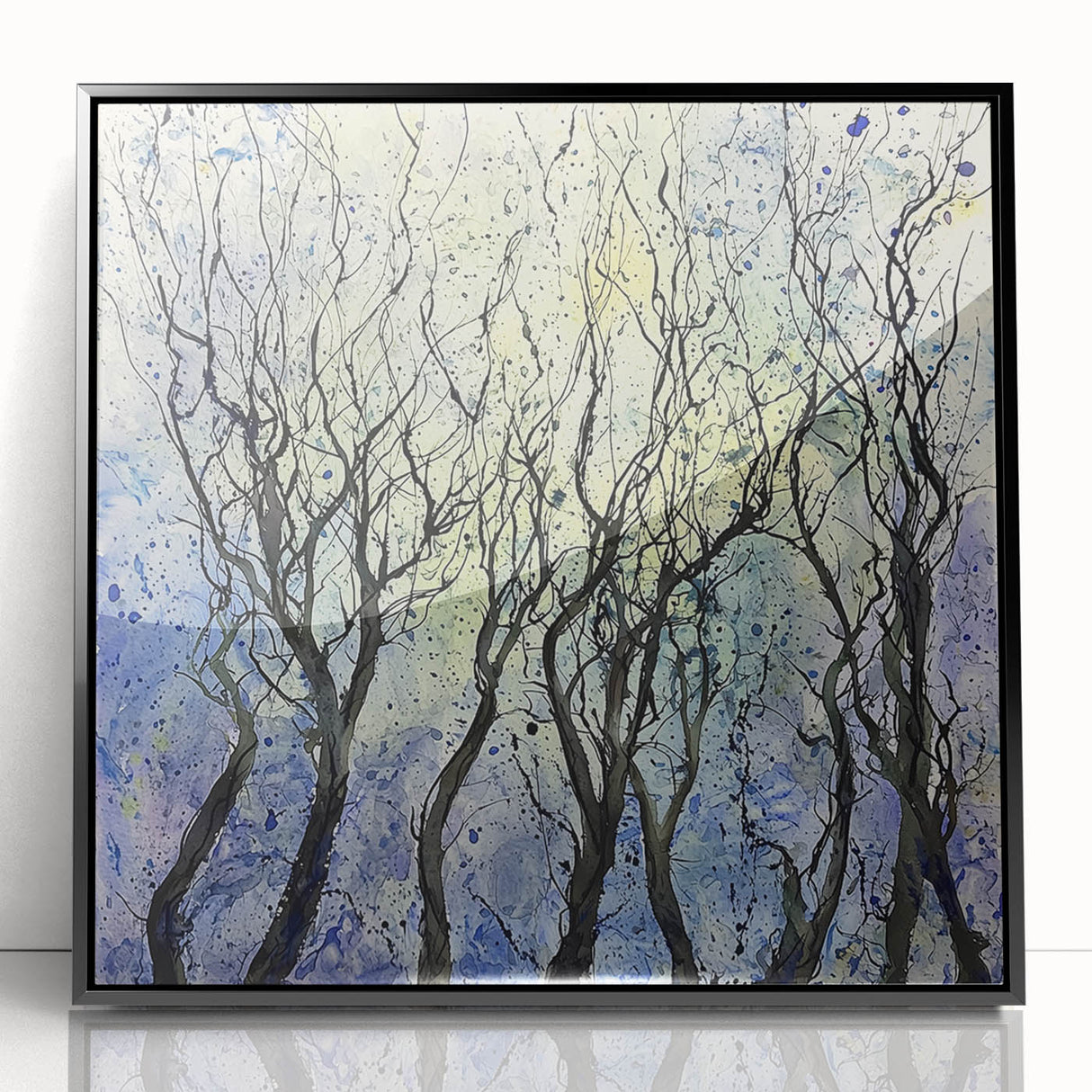 Framed acrylic artwork showcasing vibrant abstract florals in a sleek black frame, perfect for modern home decor. Ideal for adding color and style to living spaces.