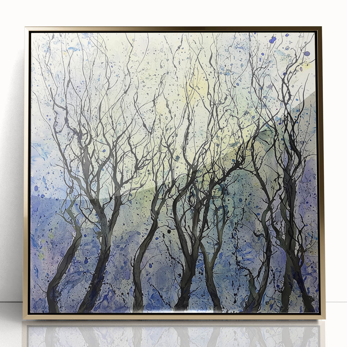 Framed acrylic artwork showcasing vibrant abstract floral designs in gold and pastel hues, adding a modern touch to home decor with elegant detailing.