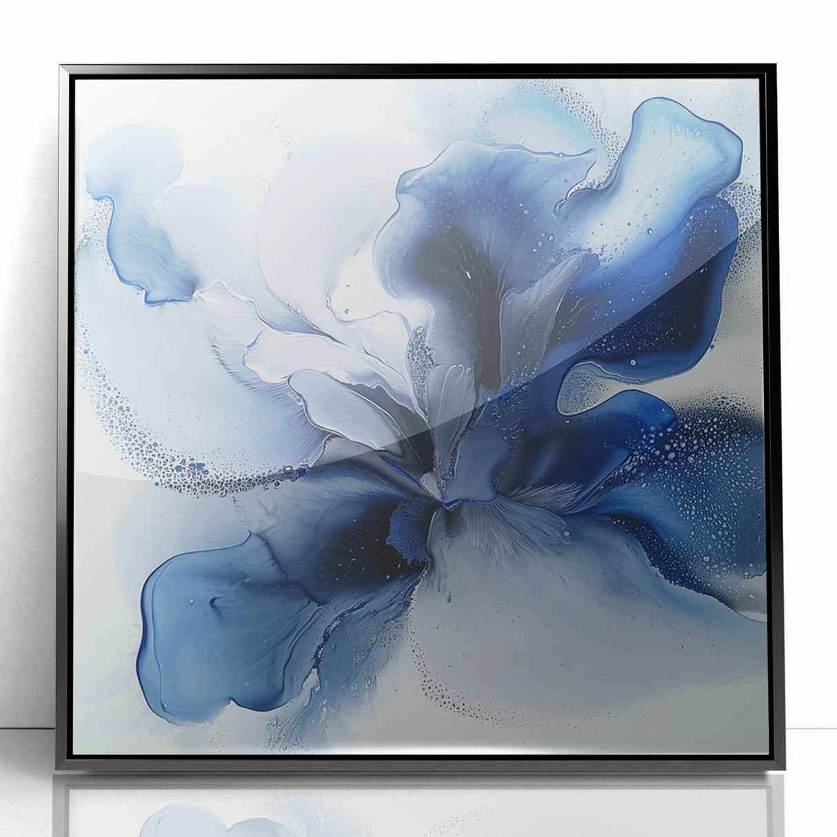 Framed abstract floral artwork in vibrant colors, featuring delicate petals and intricate details, displayed in a sleek black frame, perfect for modern home decor.