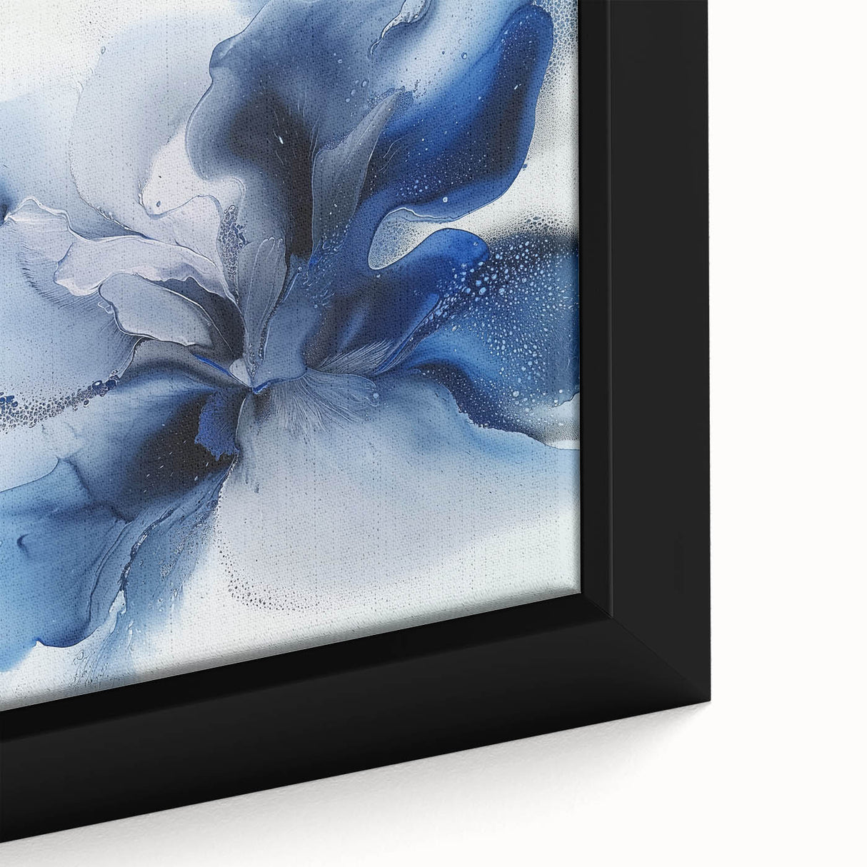 Close-up of an abstract floral framed canvas art piece showcasing vibrant colors of pink, yellow, and green, ideal for modern home decor enhancements.