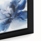 Close-up of an abstract floral framed canvas art piece showcasing vibrant colors of pink, yellow, and green, ideal for modern home decor enhancements.