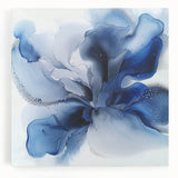 Stretched canvas artwork featuring vibrant abstract floral designs in rich colors, set against a modern backdrop. Ideal for enhancing contemporary home decor.