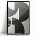 Framed abstract minimalist wall art featuring a sleek black design, perfect for modern decor. This acrylic piece adds a sophisticated touch to any room with its elegant simplicity.