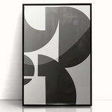 Framed abstract minimalist wall art featuring a sleek black design, perfect for modern decor. This acrylic piece adds a sophisticated touch to any room with its elegant simplicity.