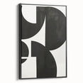 Framed abstract minimalist wall art featuring a sleek black design, displayed from a side view, perfect for modern home decor. Ideal for adding elegance and sophistication to any room.