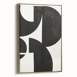 Framed minimalist wall art featuring abstract gold design on a canvas, displayed in a sleek black frame, perfect for modern home decor and artistic flair.