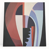 Abstract geometric stretched canvas artwork featuring bold colors and dynamic shapes, leaning against a neutral wall, ideal for modern decor.
