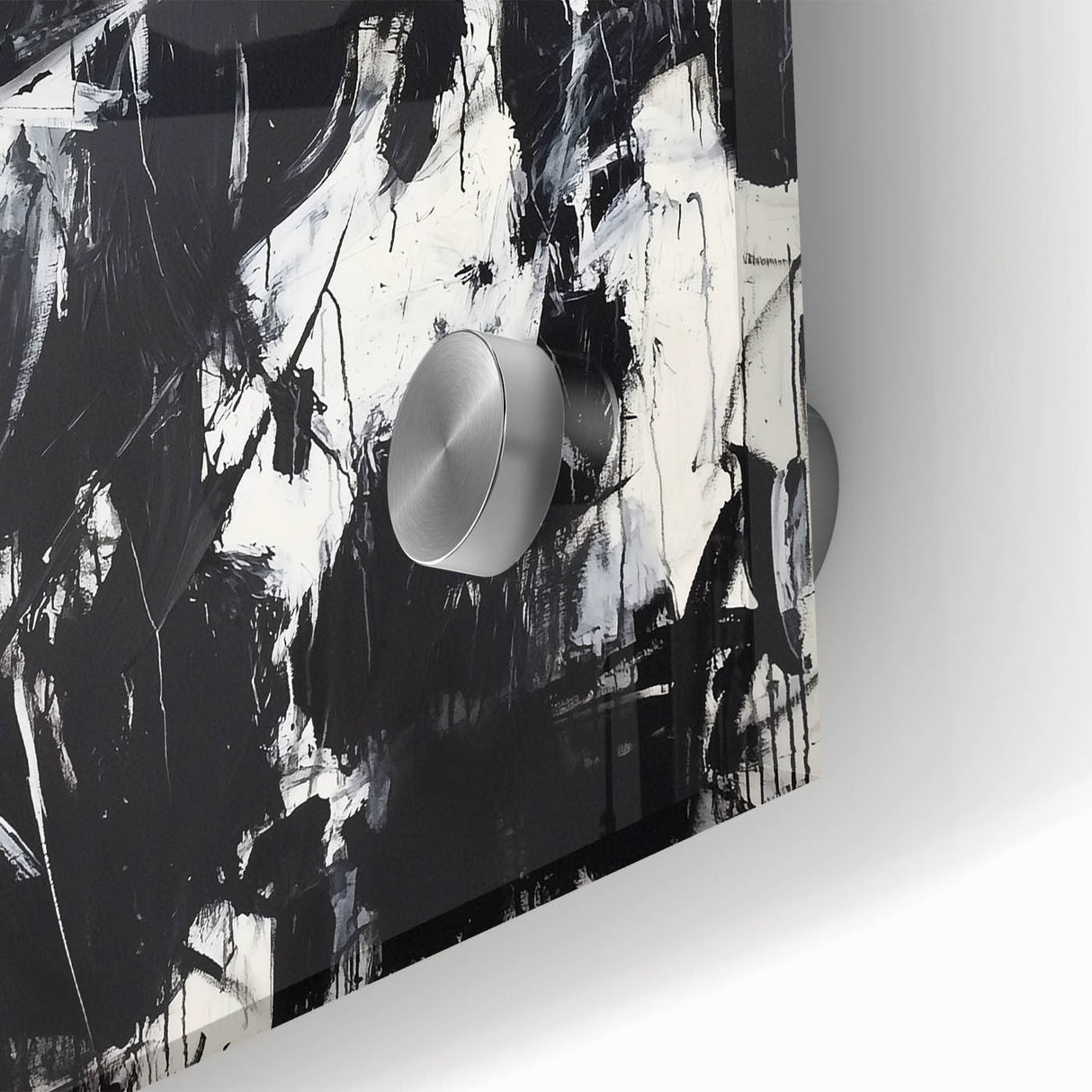 Close-up of an abstract acrylic glass artwork showcasing vibrant splatters of blue, orange, and yellow, perfect for modern home decor and artistic inspiration.
