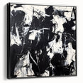 Framed canvas artwork showcasing abstract black splatter designs, featuring a sleek side view that emphasizes its modern aesthetic and textured finish, suitable for contemporary home decor.
