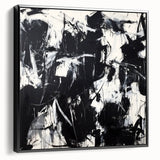Framed canvas artwork showcasing abstract black splatter designs, featuring a sleek side view that emphasizes its modern aesthetic and textured finish, suitable for contemporary home decor.