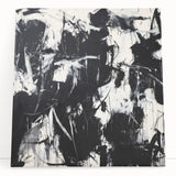 Abstract splatter art canvas with vibrant colors, featuring dynamic paint splashes on a textured surface, perfect for modern home decor and art enthusiasts.