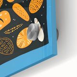 Mid-century modernist acrylic glass print of abstract pastries in muted earth tones, suitable for dining room art.