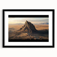 Desert landscape framed art print with a black mat and sleek frame, showcasing warm hues of sand and blue sky, perfect for modern home decor.