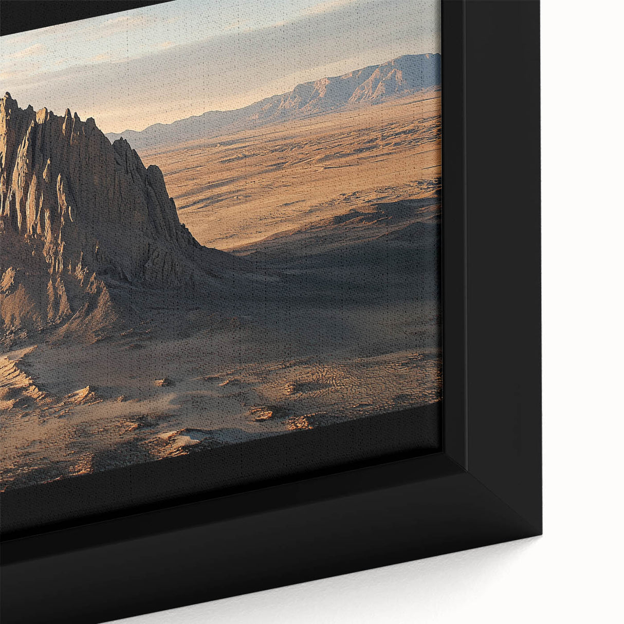 Close-up of a framed canvas showcasing a vibrant desert landscape, featuring warm hues of orange and gold with intricate details of cacti and mountains, ideal for modern home decor.