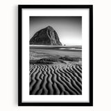 Framed landscape art print showcasing serene sand dunes in warm tones, set in a sleek black frame with a white mat, perfect for modern home decor.