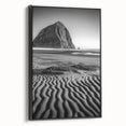 Framed canvas art showcasing a serene desert landscape with rolling dunes, presented in a sleek black frame, perfect for modern home decor.