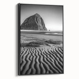 Framed canvas art showcasing a serene desert landscape with rolling dunes, presented in a sleek black frame, perfect for modern home decor.