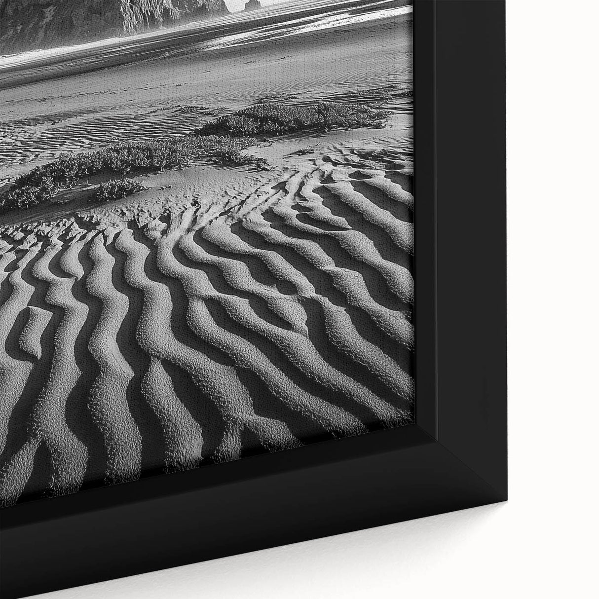 Close-up of a framed canvas artwork depicting vibrant desert dunes at sunset, showcasing rich hues of orange and gold, perfect for home decor in modern aesthetics.