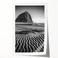 Desert landscape print showcasing vibrant, undulating sand dunes in warm, earthy tones, rolled and ready for display, enhancing your home decor.