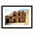 Abstract art print featuring colorful, textured Moroccan scenery on a large framed canvas, ideal for living room decor.