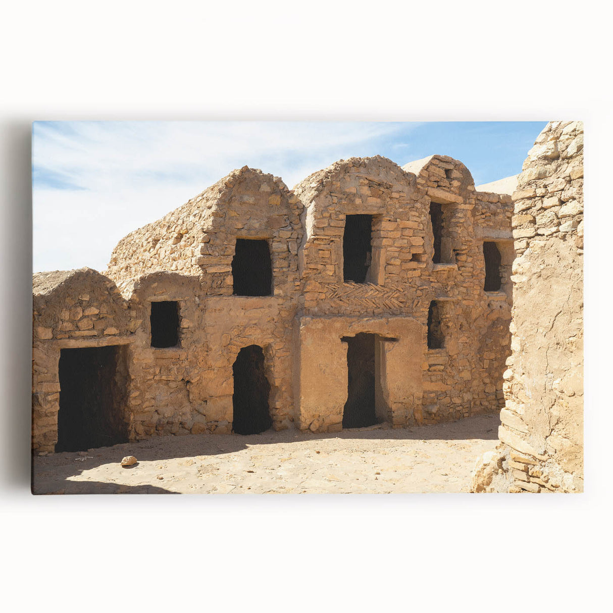 Black and white stretched canvas featuring a Moroccan landscape, ideal for kitchen wall art.