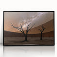 Large abstract wall art depicting a Namibian landscape in muted earth tones, framed in black acrylic.