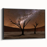 Black and white wall art featuring a vintage poster-style landscape of Namibia on framed canvas, suitable for bedroom decor.
