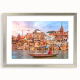 Textured abstract art print depicting an Indian landscape in earthy tones, framed in silver, ideal for bedroom decor.