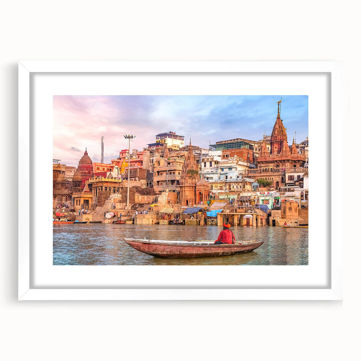 Abstract art print of Indian scenery in muted earth tones on a white framed mat, suitable for dining room decor.
