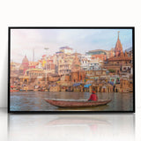 Large abstract wall art depicting a stylized Indian landscape in vibrant orange and red tones, framed in black acrylic.