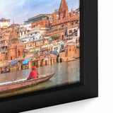 Close-up of a textured black wall art featuring a colorful Indian scenery on a framed canvas, ideal for living room decor.