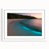 Textured abstract art print depicting a Caribbean scenery in blue and green tones, framed in white.