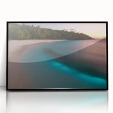 Large abstract wall art depicting a Caribbean scenery in vibrant blue and green tones on a framed acrylic.