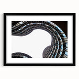 Extra large abstract art print depicting a colorful, textured European scenery on a black framed canvas.