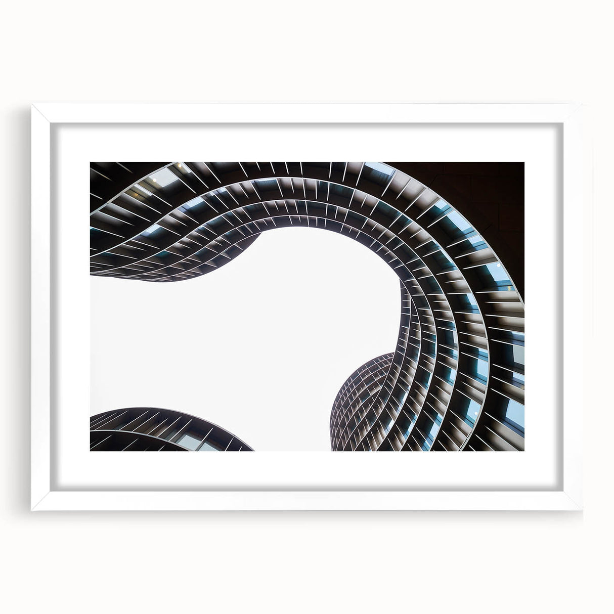 Textured abstract art print depicting a serene European landscape in muted earth tones, framed with a white mat.