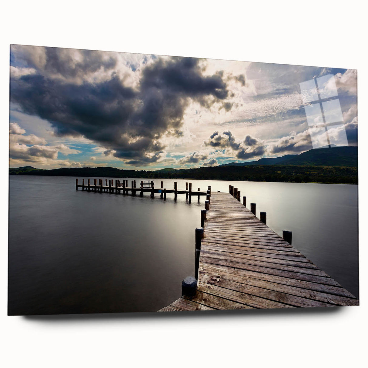 Large abstract wall art of Cumbria's landscape in muted green and blue tones on acrylic glass.