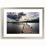 Extra large wall art of abstract Cumbrian landscape in muted green and blue tones, framed in silver.