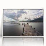 Mid-century modernist art depicting Cumbria's landscape in muted green and blue tones, acrylic print framed in white.