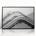 Large abstract wall art depicting a stylized London skyline in muted gray and black tones, acrylic print in a black frame.