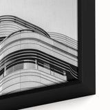 Black wall art featuring a textured depiction of London's skyline in colorful art style, framed canvas.