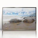 Large art print of a serene Estonian landscape in muted green and blue tones, framed in silver acrylic.