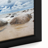 Close-up of a black framed canvas depicting a textured, colorful European scenery.