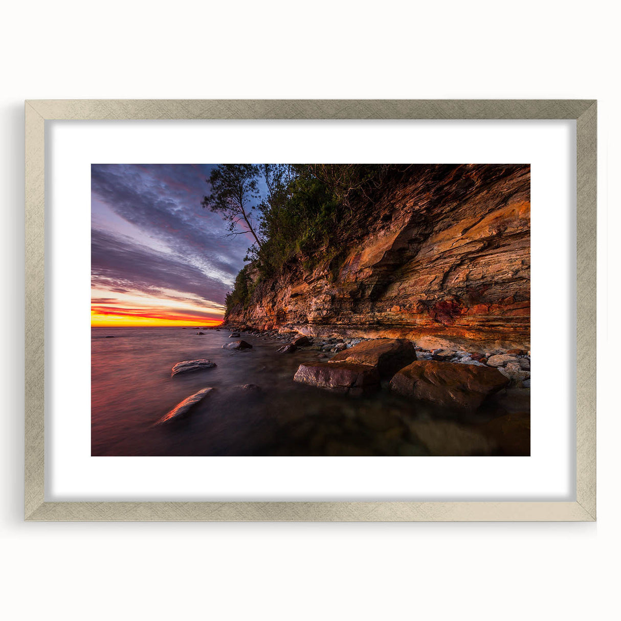 Extra large abstract art print depicting a textured Finnish landscape in cool blue and gray tones, framed in silver.