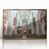 Acrylic print of the French Alps in muted earth tones, framed in gold, suitable as modern art wall decor for a nursery.