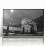 Large acrylic print of a Parisian street scene in muted grays and blues, framed in silver, ideal for modern art wall decor.