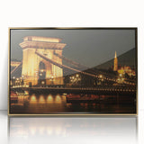 Art deco poster of a European cityscape in muted gold and gray tones, framed acrylic, ideal for modern nursery wall art.